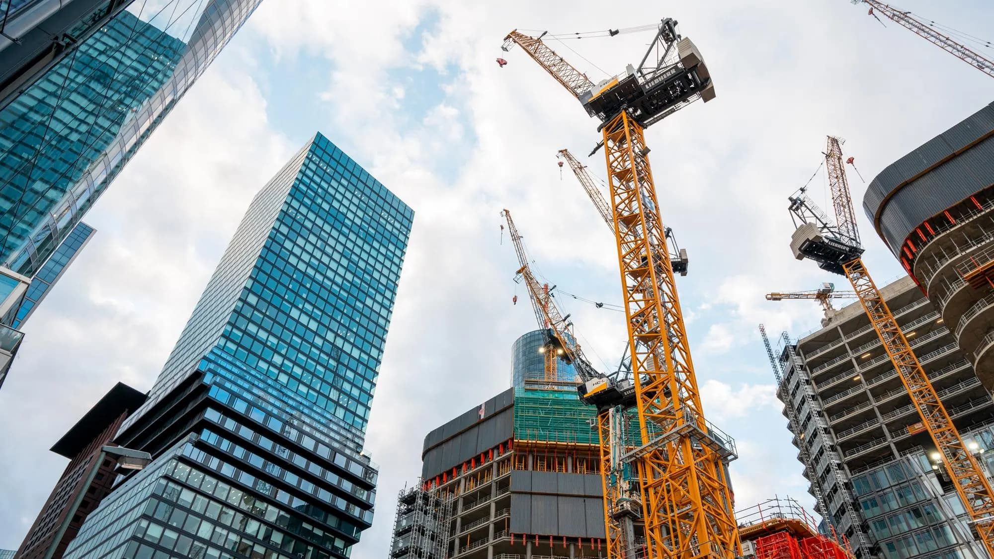 Tower cranes over a high-rise construction site